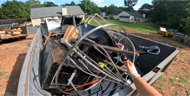 Before dumpster rental - junk and waste pile before cleanup in Owensboro, KY